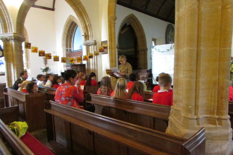 The harvest service led by Reverend Helene Stainer in St. Peter's Church, Langford Budville.
